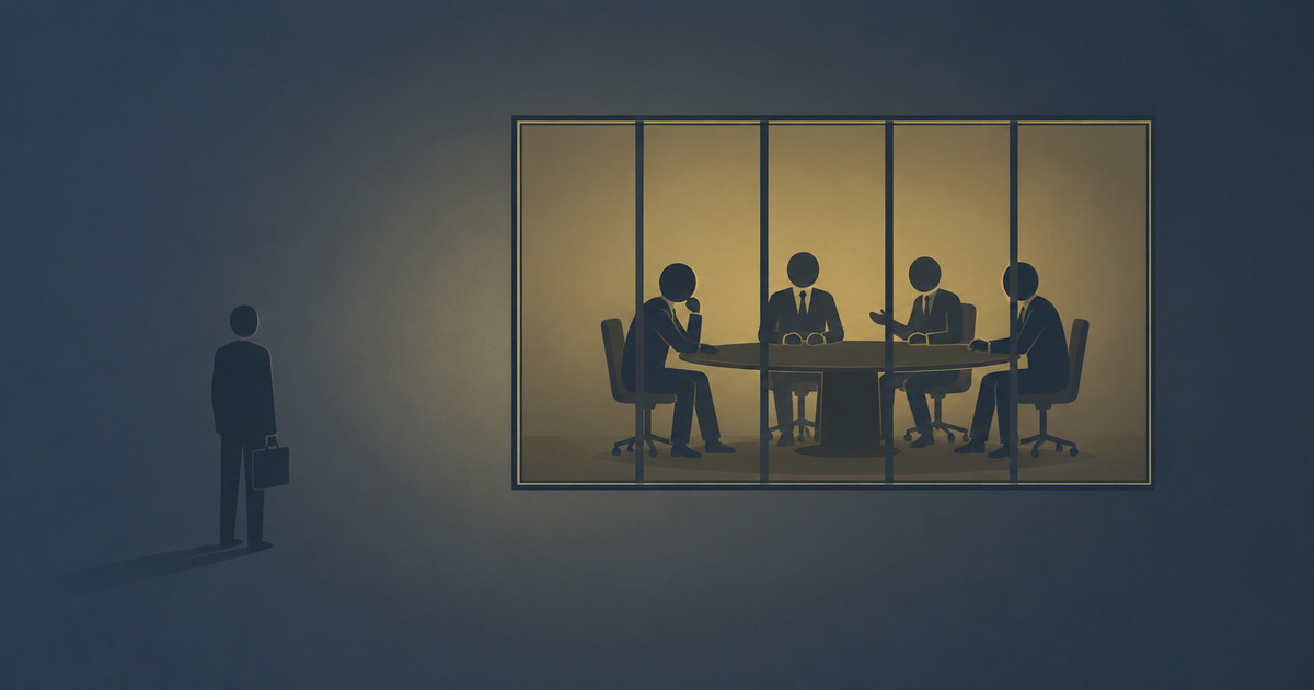 A lone figure outside a lit glass-walled conference room